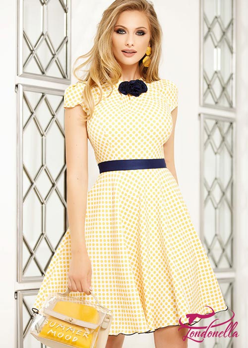 Feel girly with this dress cut closed print yellow polka dots