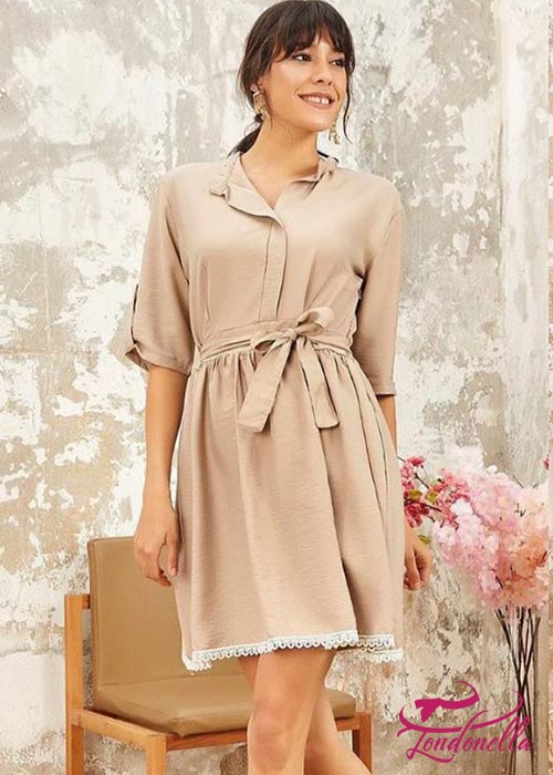 Beige summmer dress with the same fabric collar on the waist