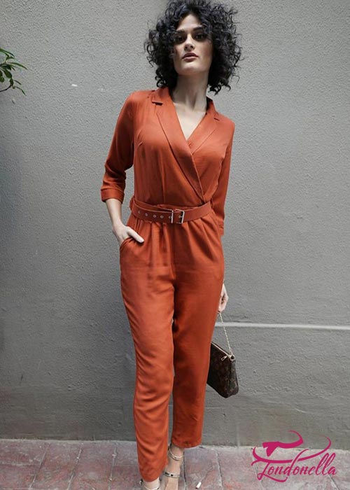 Perfect jumpsuit in orange color with belt on the waist