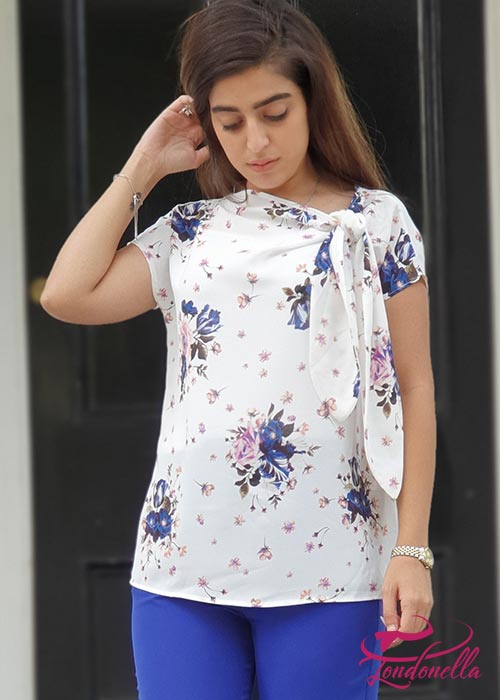 Summer white blouse with floral prints with tie on top
